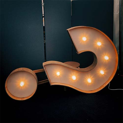 hanging decorative light in the shape of a question mark